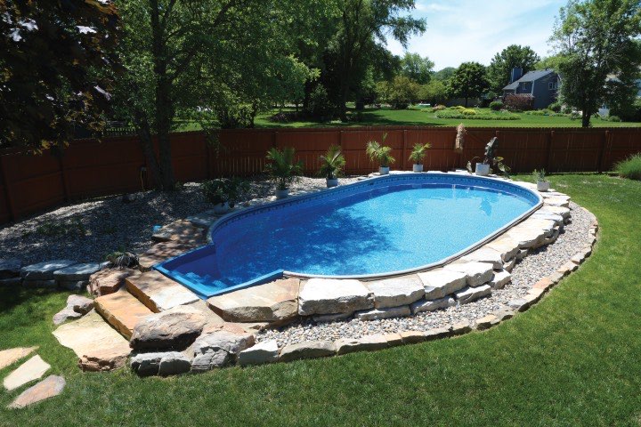 Hydrosphere Oval 15×30: semi-inground with boulders and stone steps