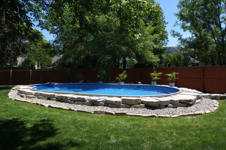 Hydrosphere Oval 15×30: semi-inground with boulders