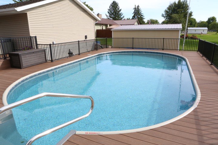Hydrosphere Oval 18×33: semi-inground with a top rail and wood deck