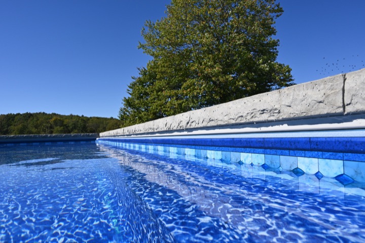 Close-up of the coping and liner border of a DB Trimax pool